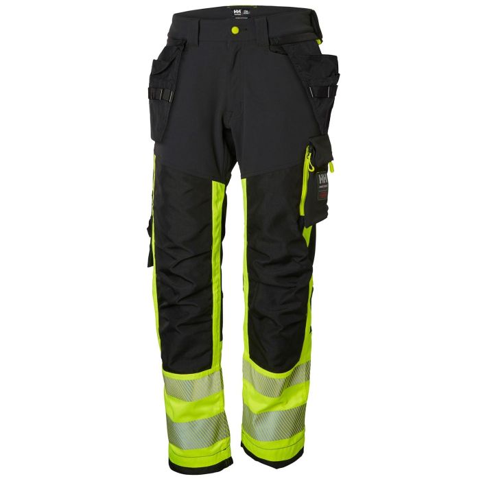 Helly Hansen Work Wear Icu Huomio Riipputaskuhousut 1 Lk. keltainen/harmaa Kestava neljaan suuntaan joustava kangas nayttaa