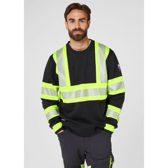 Helly Hansen Work Wear Icu Huomio Collegepaita kelt/musta Mukava ja turvallisuusstandardin mukainen. ICU Sweater-paidassa